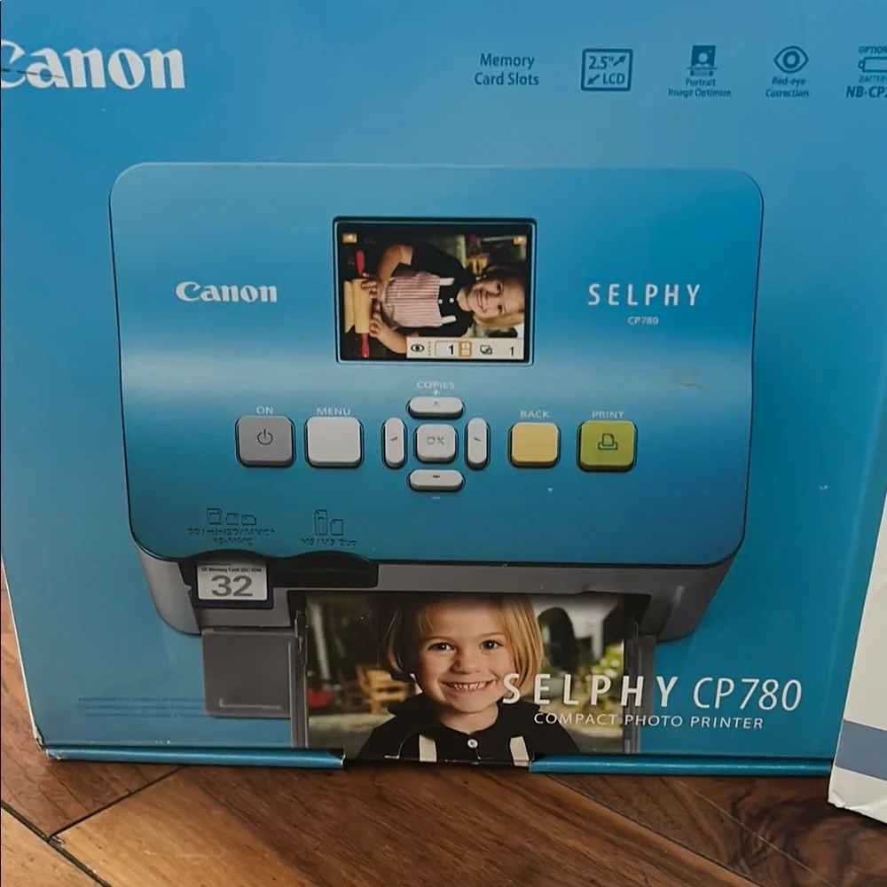 Canon Selphy CP780 Compact Photo Printer - Blue w/ Color Ink and Paper Bundle